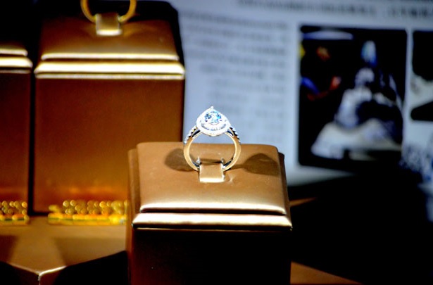 halo blue diamond ring